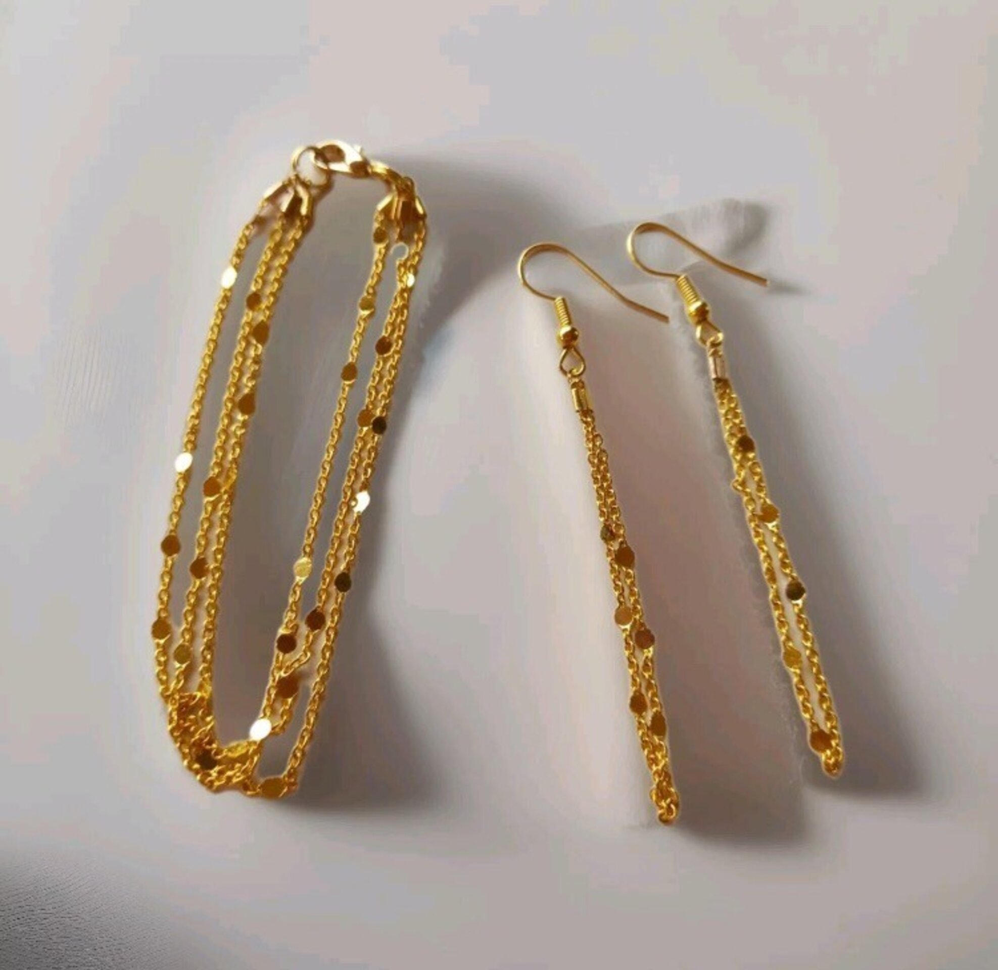 Conjunto pulsera y pendientes de cadena fina color oro - 5